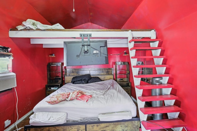 bedroom featuring vaulted ceiling