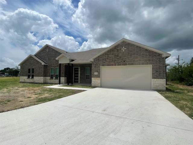 view of front of home with a garage