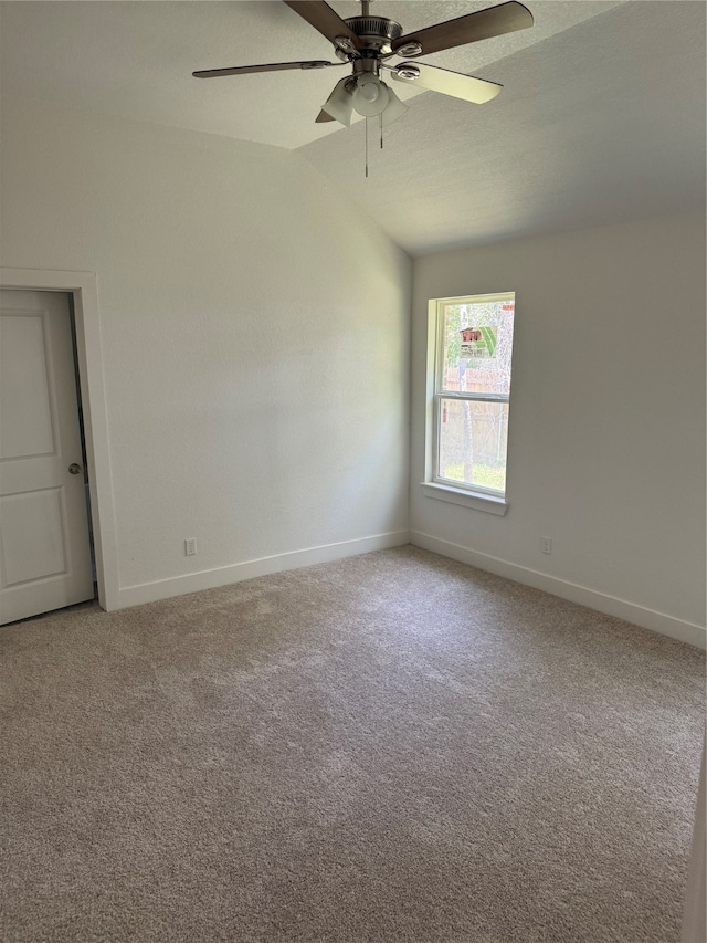 unfurnished room with carpet floors, ceiling fan, and lofted ceiling