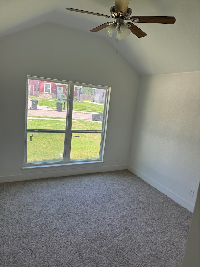 additional living space featuring lofted ceiling, carpet floors, and ceiling fan