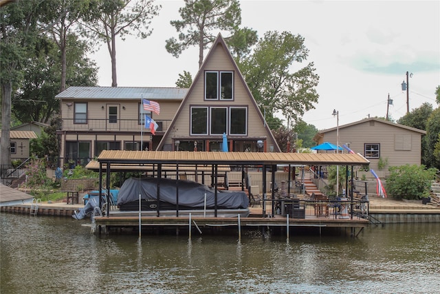 dock area with a water view