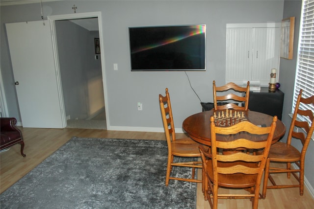 dining room featuring wood-type flooring