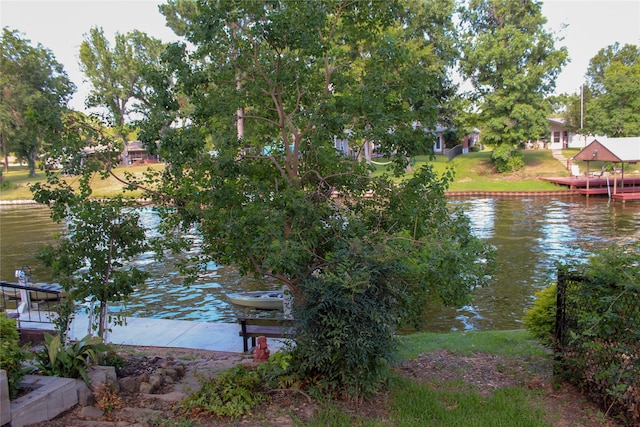 property view of water featuring a boat dock