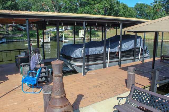 dock area featuring a water view