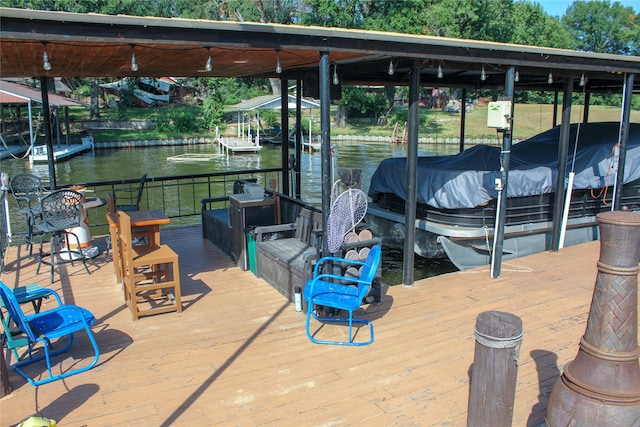 view of dock with a water view