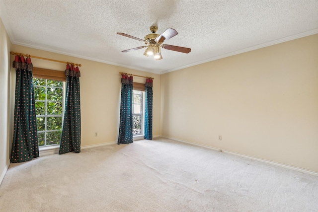 unfurnished room with ornamental molding, plenty of natural light, and light colored carpet