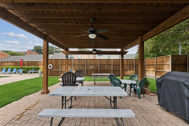 view of patio / terrace featuring a grill and ceiling fan