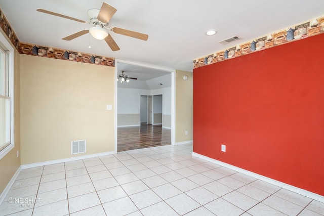 empty room featuring light tile patterned floors