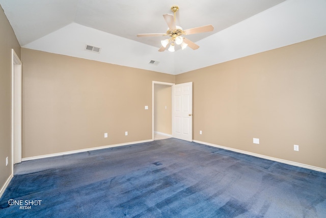 carpeted empty room featuring lofted ceiling and ceiling fan