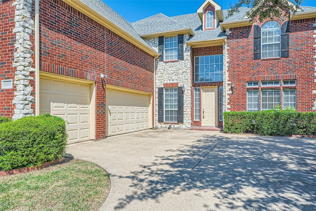 view of front of property with a garage