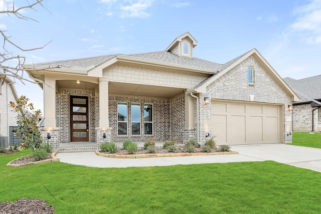 view of front facade featuring a garage and a front lawn