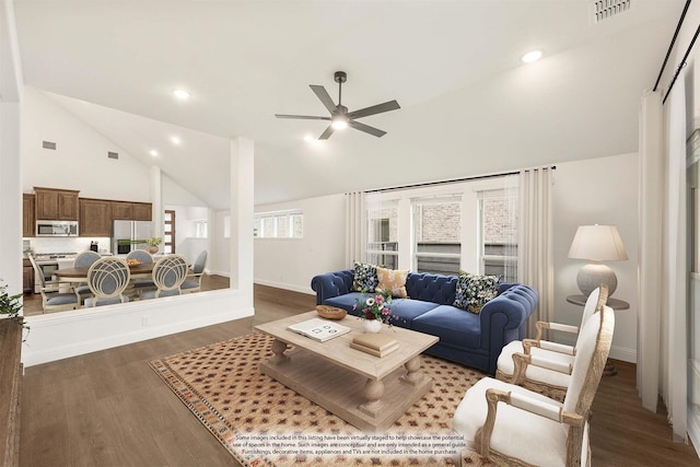 living room with ceiling fan, high vaulted ceiling, and dark wood-type flooring