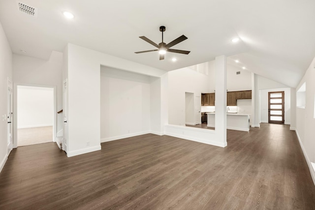 unfurnished living room with dark hardwood / wood-style floors, ceiling fan, and high vaulted ceiling