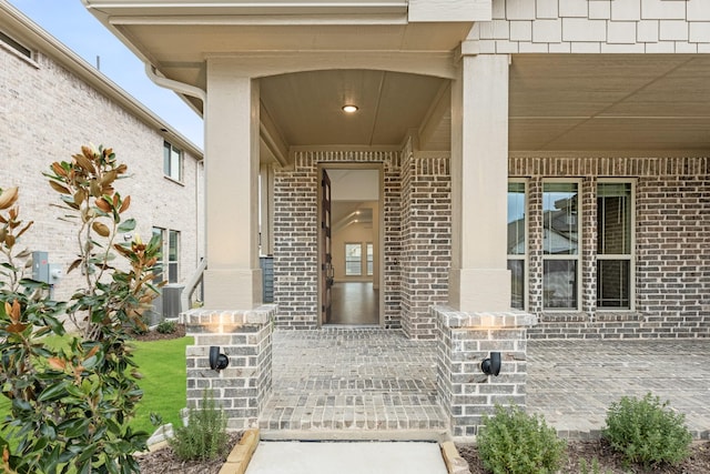 property entrance featuring covered porch