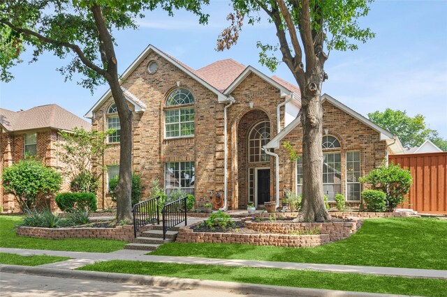 view of front property with a front yard