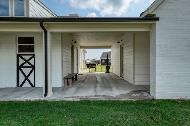 view of patio featuring a carport