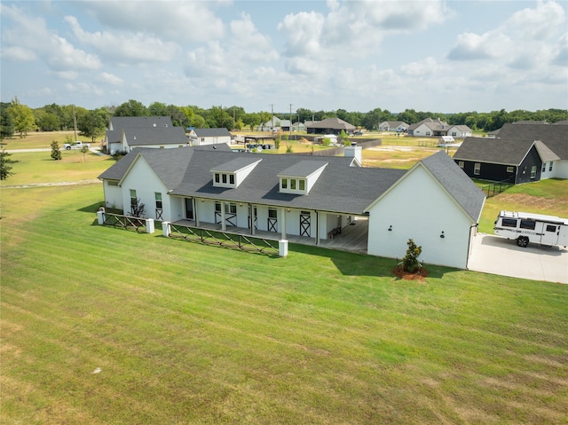 view of front of home featuring a front lawn and a porch