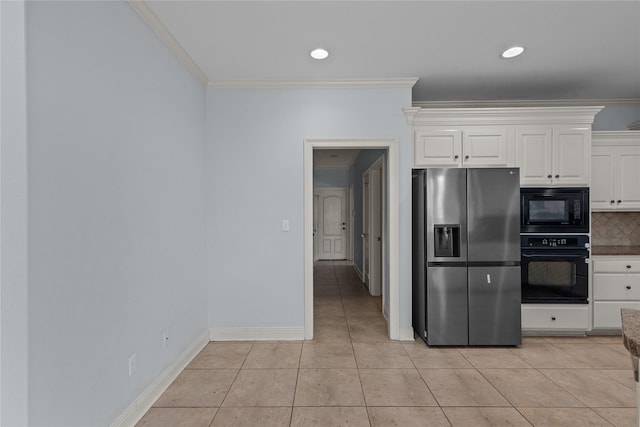 kitchen featuring white cabinetry, crown molding, black appliances, and light tile patterned flooring