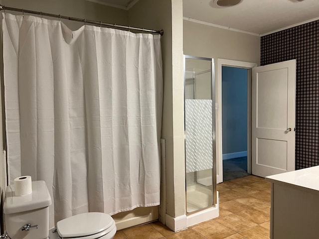 bathroom featuring ornamental molding, walk in shower, vanity, and toilet