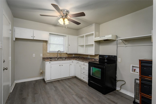 kitchen featuring sink, electric range, wood-type flooring, and white cabinets