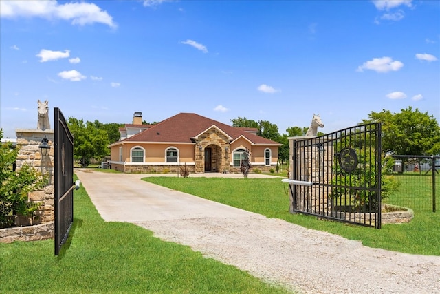 view of front of house with a front lawn