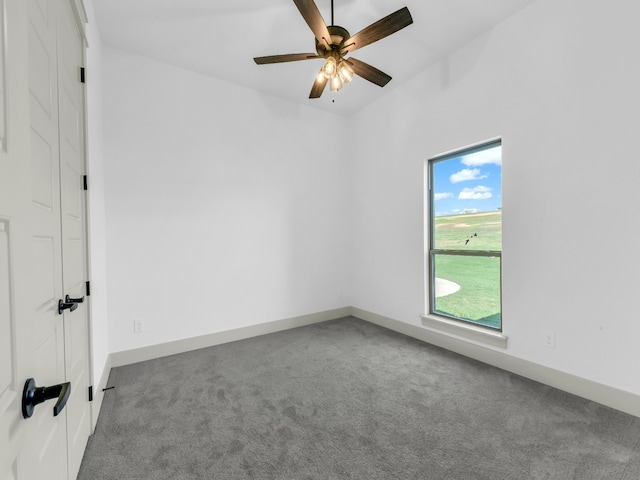 carpeted empty room with ceiling fan