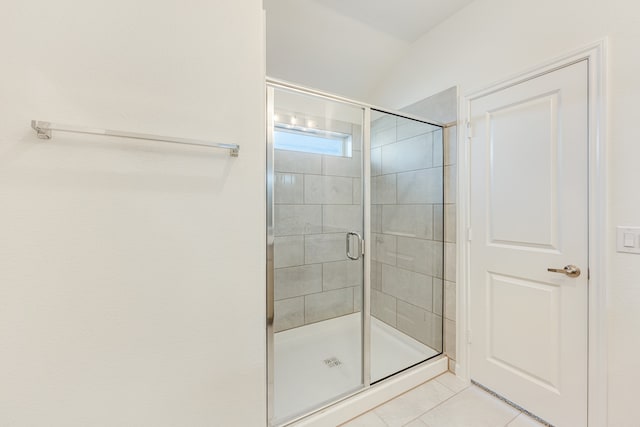 bathroom featuring tile patterned floors and walk in shower