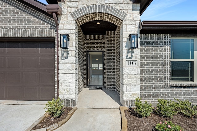 entrance to property with a garage