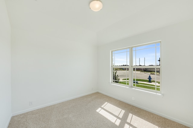 unfurnished room featuring carpet