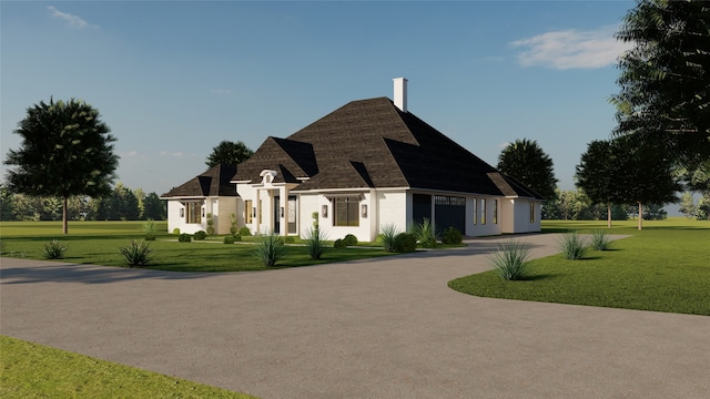 french provincial home featuring a front yard