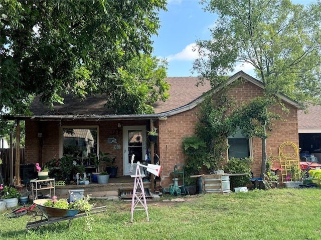 view of front of home with a front yard