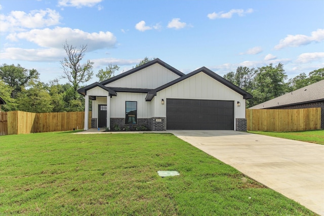 view of front facade with a front lawn and a garage