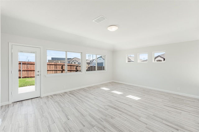 empty room featuring light hardwood / wood-style floors