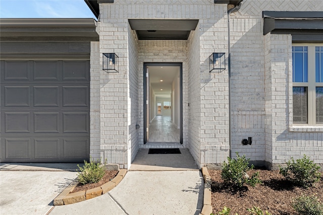 property entrance with a garage