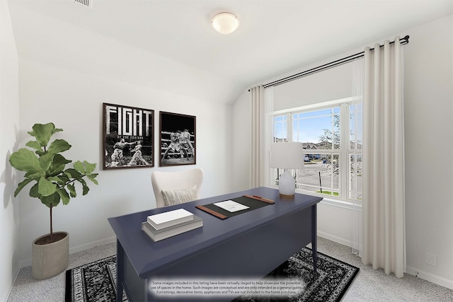 office area featuring carpet and lofted ceiling