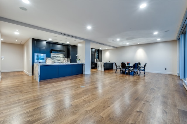 living room with light hardwood / wood-style floors