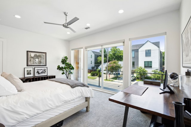 carpeted bedroom featuring access to exterior and ceiling fan