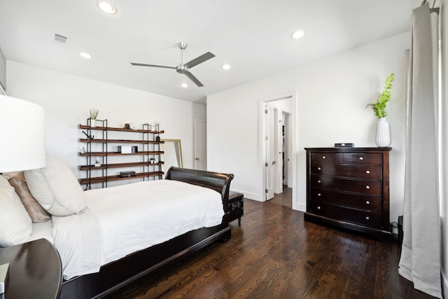 bedroom featuring dark hardwood / wood-style floors and ceiling fan