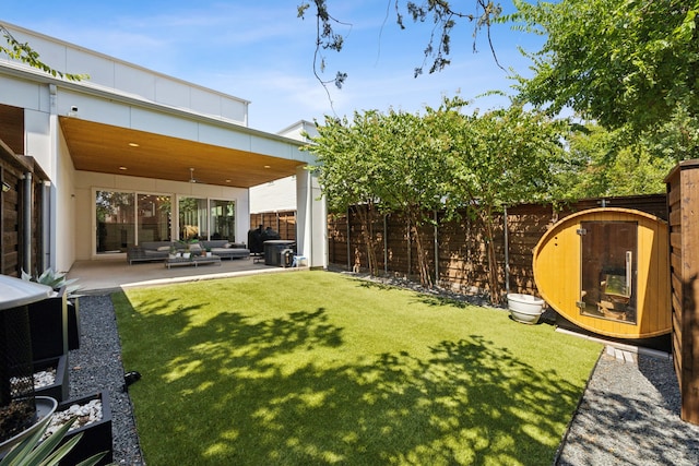 view of yard with a patio area and outdoor lounge area