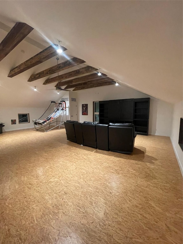 home theater with carpet flooring and vaulted ceiling with beams