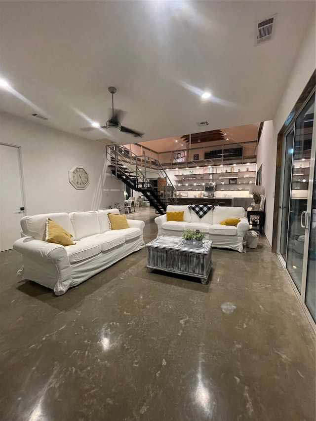 living room with ceiling fan