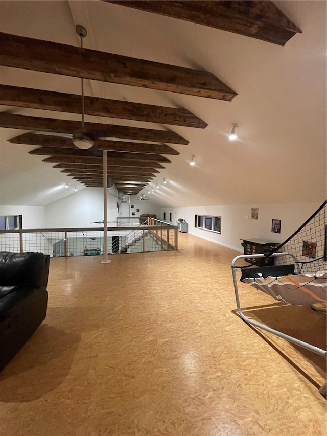 workout room featuring vaulted ceiling