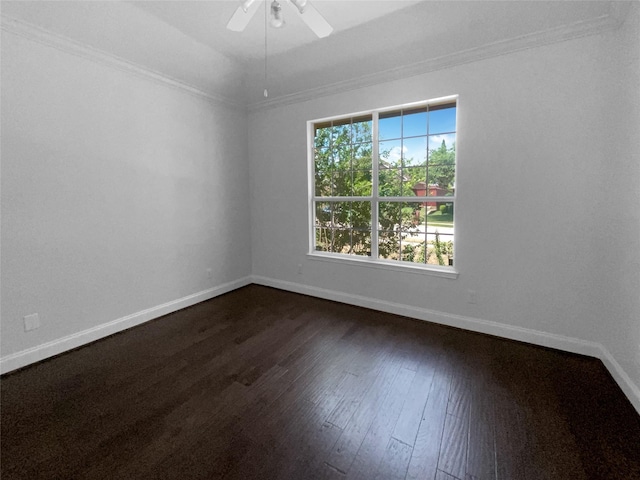 unfurnished room featuring crown molding, dark wood-type flooring, and ceiling fan