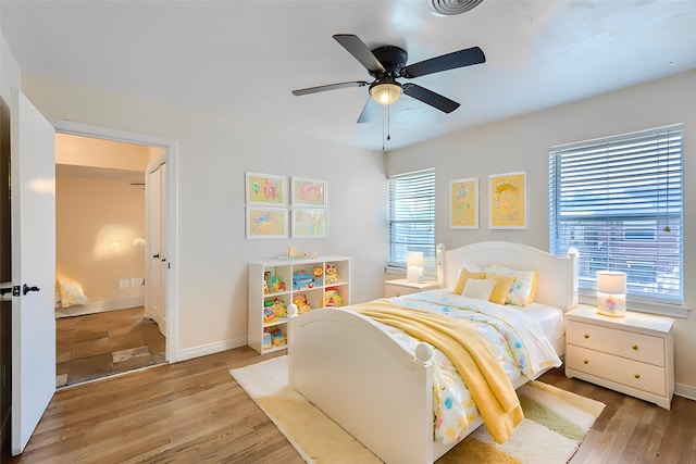 bedroom featuring ceiling fan and light hardwood / wood-style floors