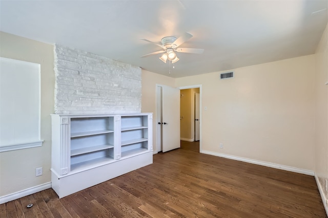 interior space with dark hardwood / wood-style floors and ceiling fan