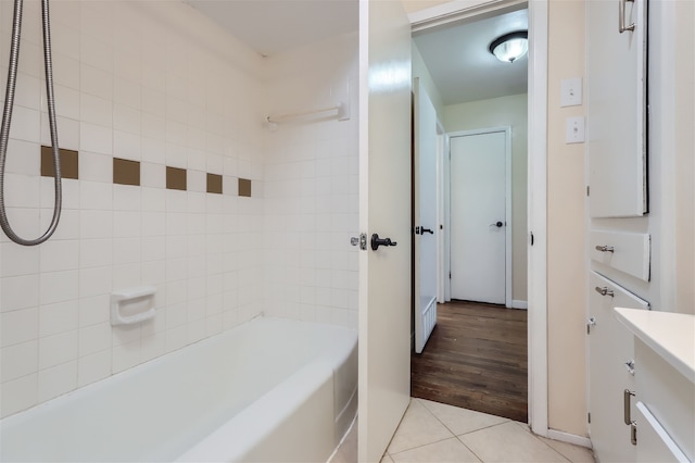 bathroom with tile patterned flooring and vanity