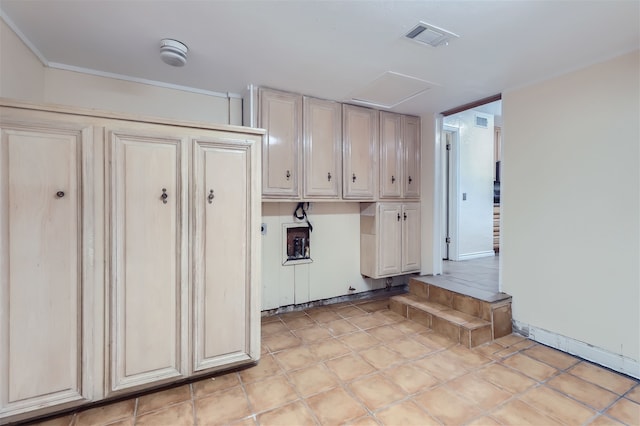 kitchen featuring cream cabinetry