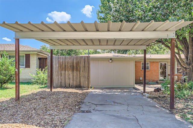 view of parking / parking lot with a carport