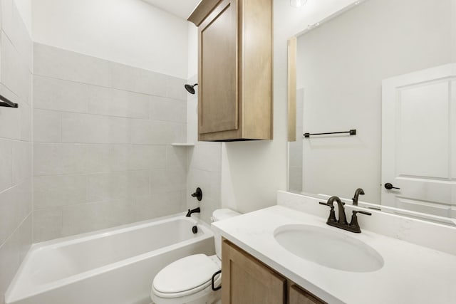 full bathroom with vanity, toilet, and tiled shower / bath combo