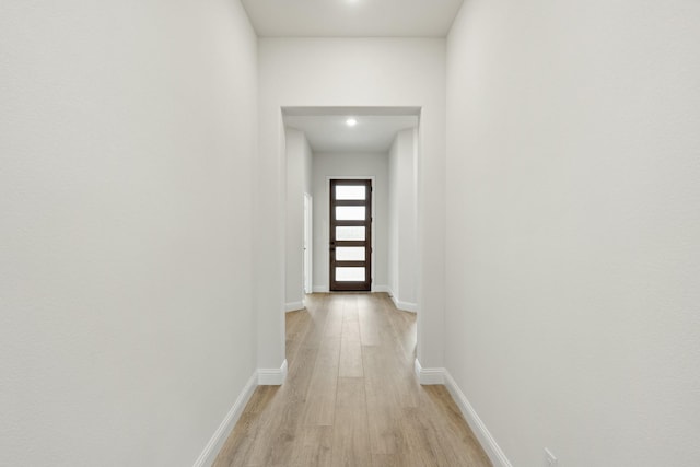 hallway featuring light wood-type flooring